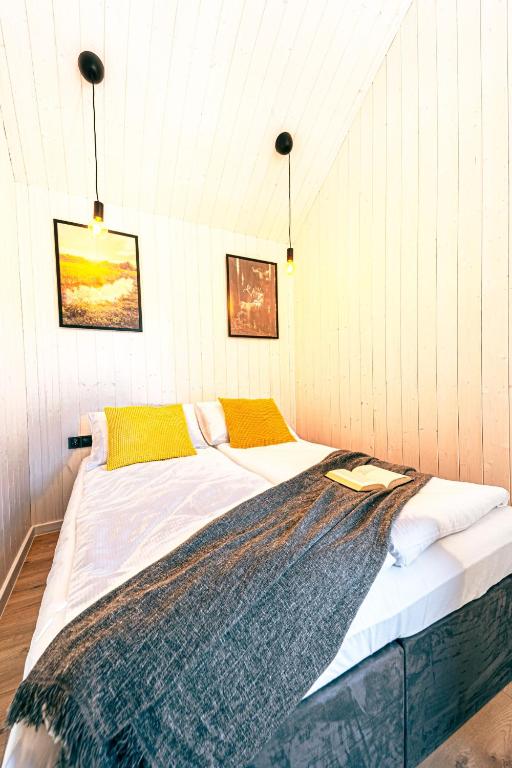 Postel nebo postele na pokoji v ubytování Wynki no. 69
