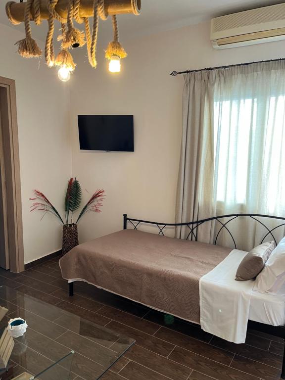 Postel nebo postele na pokoji v ubytování Kokkala Guestrooms