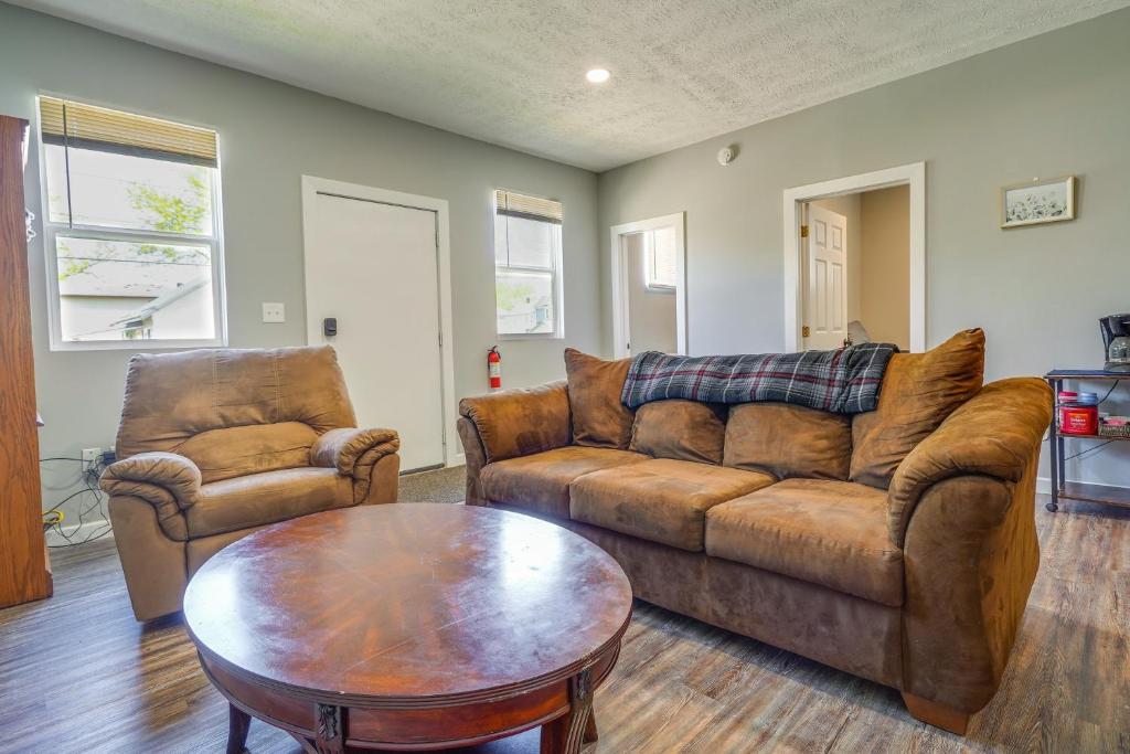 a living room with two couches and a coffee table at Zanesville Vacation Rental Near Downtown in Zanesville