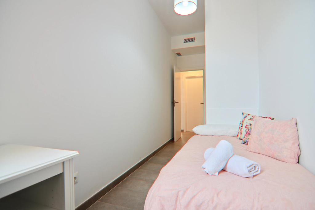 Postel nebo postele na pokoji v ubytování Apartamento San Leonardo Playa (Free Parking)
