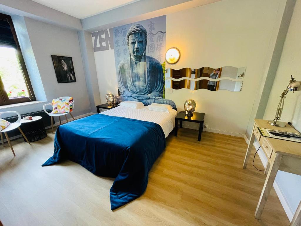 Postel nebo postele na pokoji v ubytování Hostellerie Sainte-Cécile