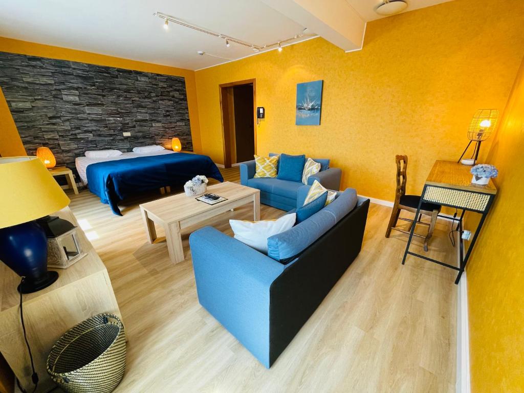 Postel nebo postele na pokoji v ubytování Hostellerie Sainte-Cécile