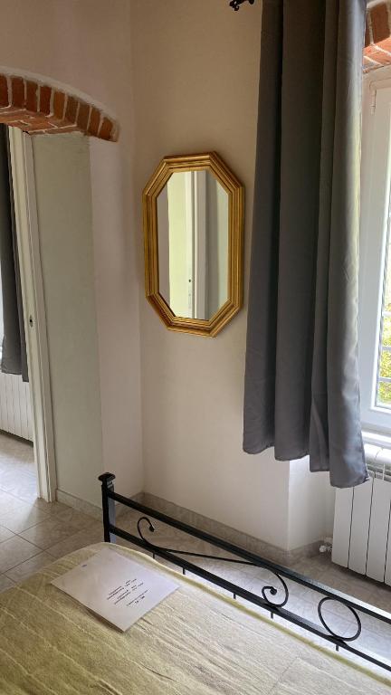 Ein Bett oder Betten in einem Zimmer der Unterkunft B&B Gronda Via Vandelli