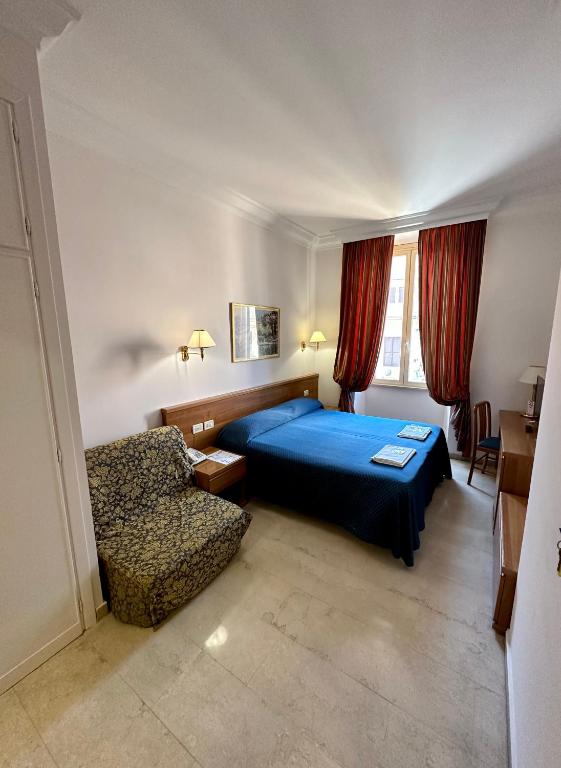 Postel nebo postele na pokoji v ubytování Hotel Principe Di Piemonte