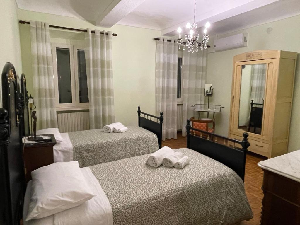 Postel nebo postele na pokoji v ubytování CA' DIJ SARACH