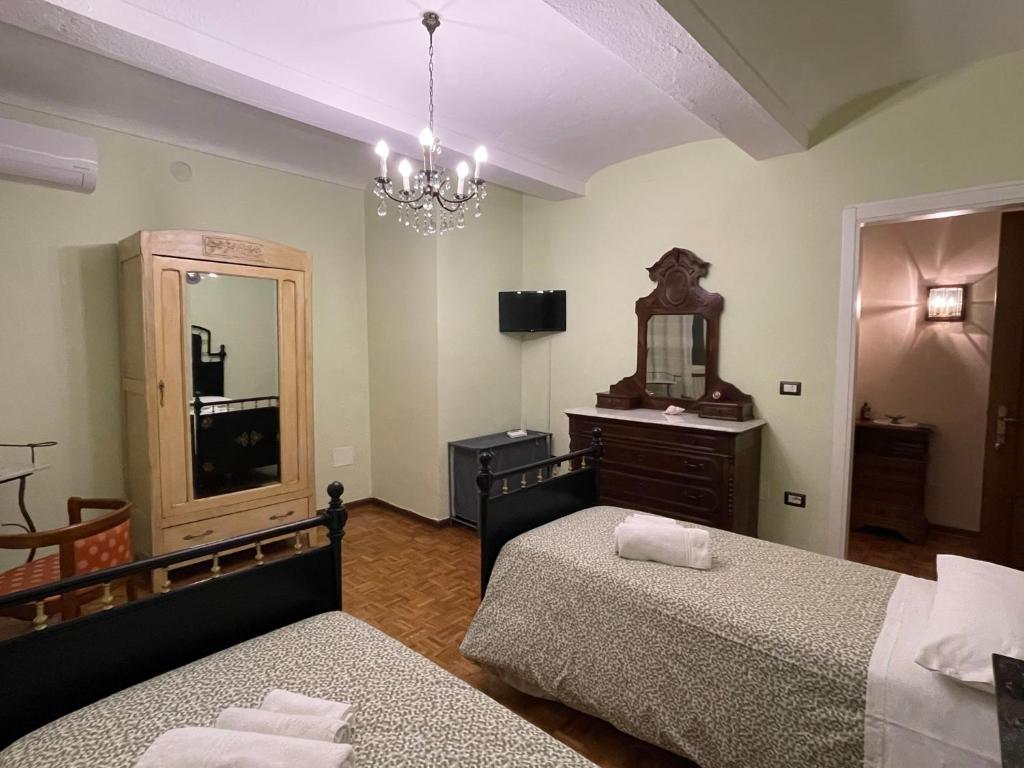 Postel nebo postele na pokoji v ubytování CA' DIJ SARACH