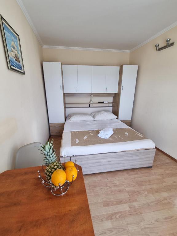 Postel nebo postele na pokoji v ubytování Apartmani Apollo - Drasnice