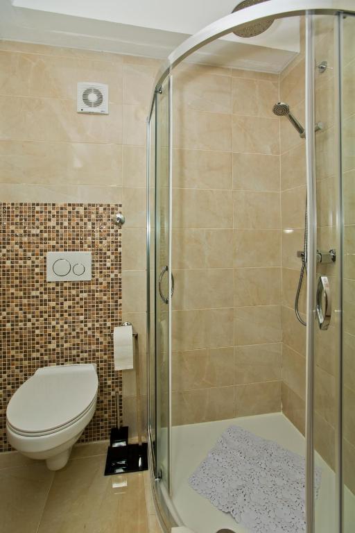 Koupelna v ubytování Guesthouse Aurora