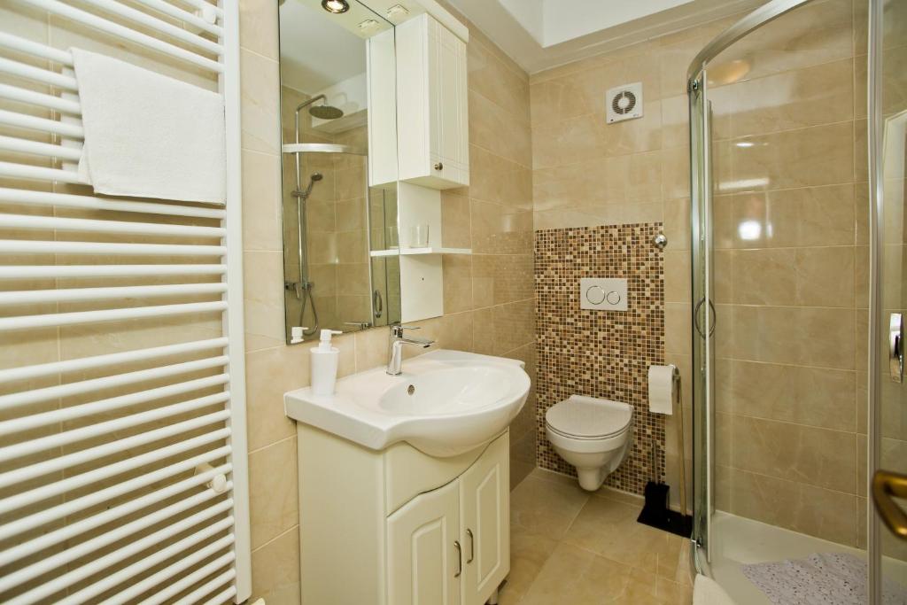 Koupelna v ubytování Guesthouse Aurora