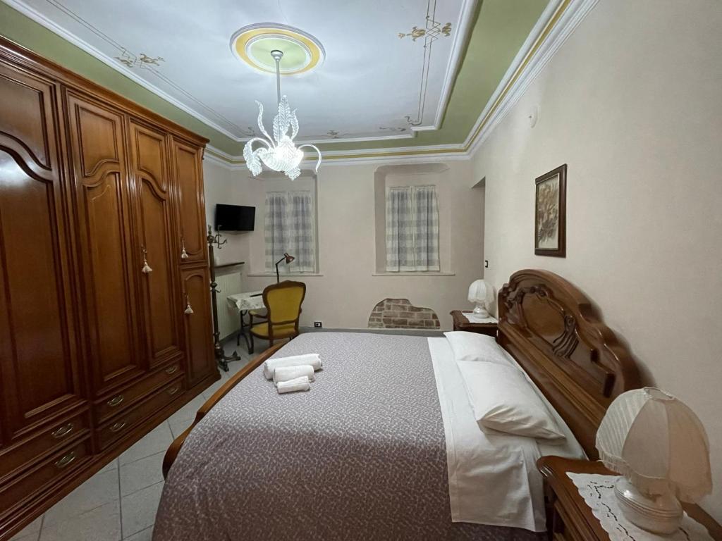 Postel nebo postele na pokoji v ubytování CA' DIJ SARACH