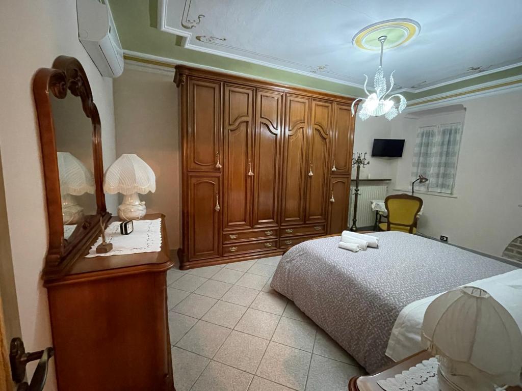 Postel nebo postele na pokoji v ubytování CA' DIJ SARACH