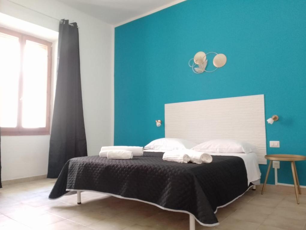Postel nebo postele na pokoji v ubytování COSTA BRAVA Guest House - Affittacamere