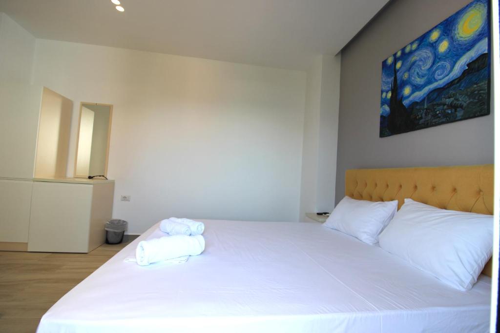 Postel nebo postele na pokoji v ubytování Hotel Bega