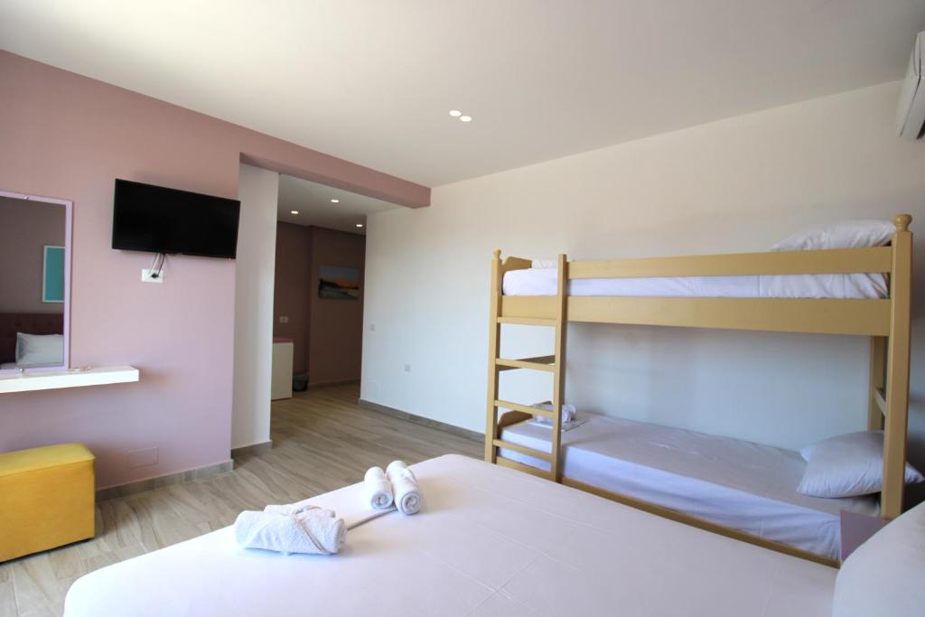 Postel nebo postele na pokoji v ubytování Hotel Bega