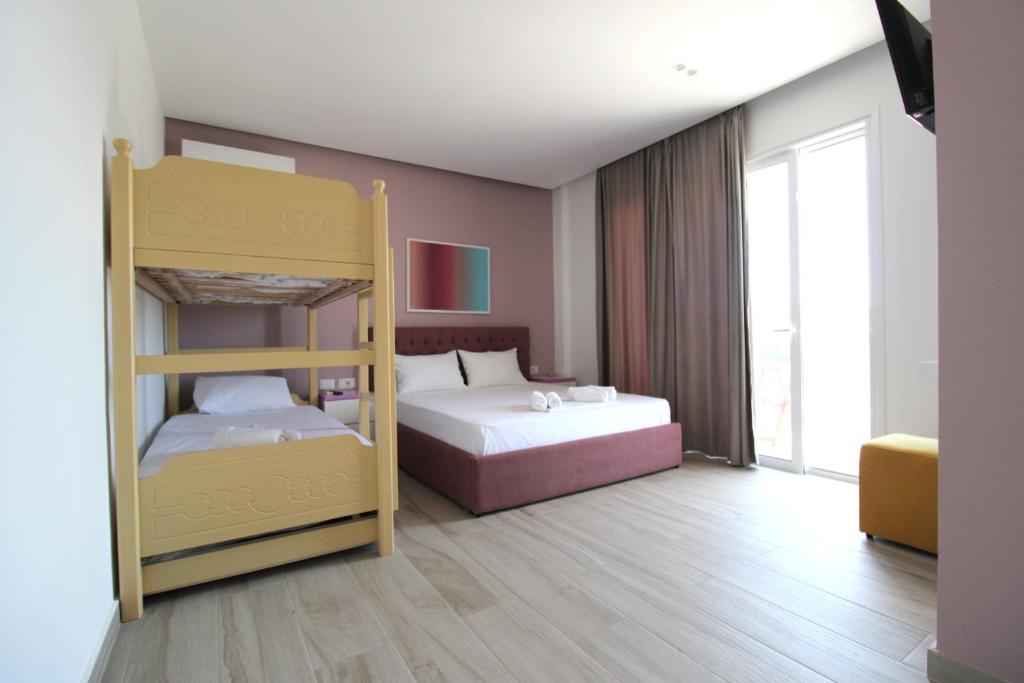 Postel nebo postele na pokoji v ubytování Hotel Bega