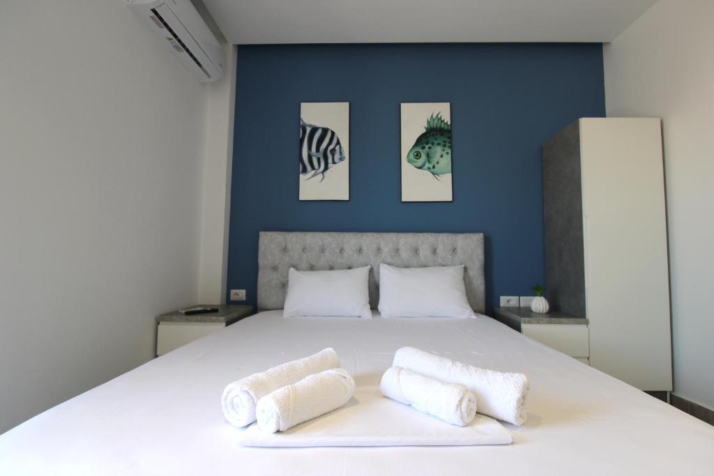 Postel nebo postele na pokoji v ubytování Hotel Bega