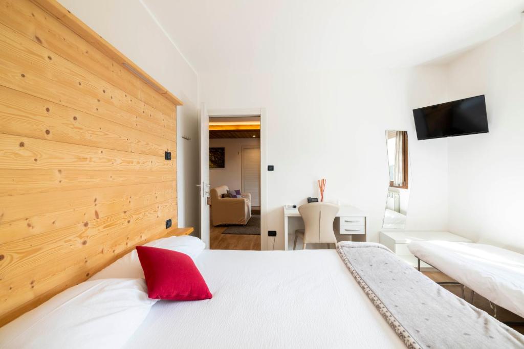 Postel nebo postele na pokoji v ubytování B&B Castello Cimbergo