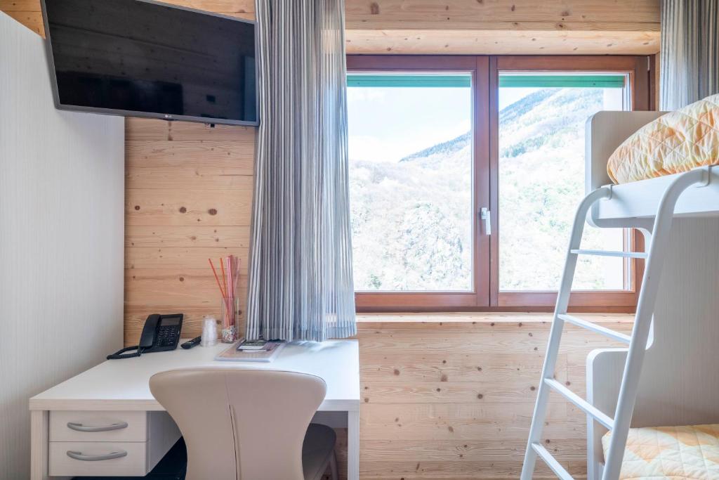 TV a/nebo společenská místnost v ubytování B&B Castello Cimbergo