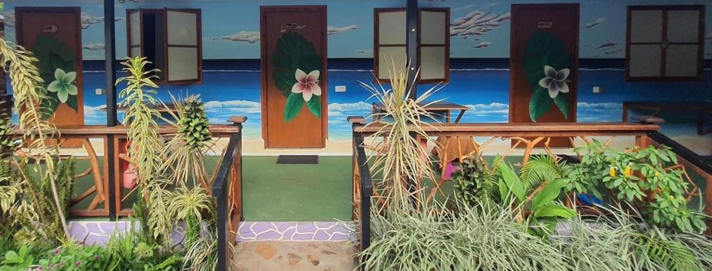 a rendering of a house with plants in front of it at Moorea Vaiare Lodge in Moorea