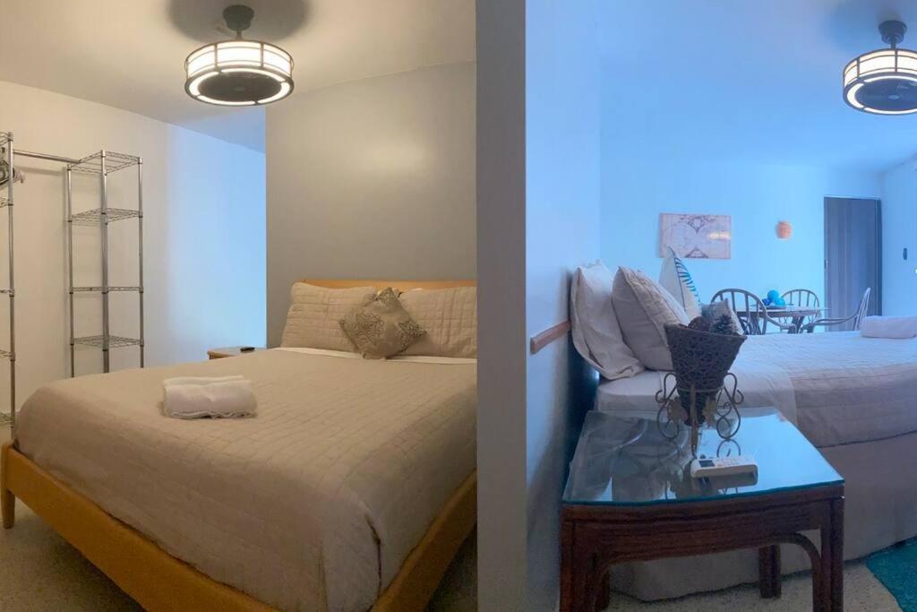 1 dormitorio con 1 cama y 1 mesa en una habitación en Mayagüez Apt- up to 4 guests- Close to Everything, en Mayagüez