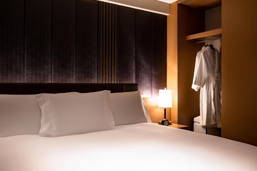 Letto o letti in una camera di The Strings by InterContinental, Tokyo by IHG