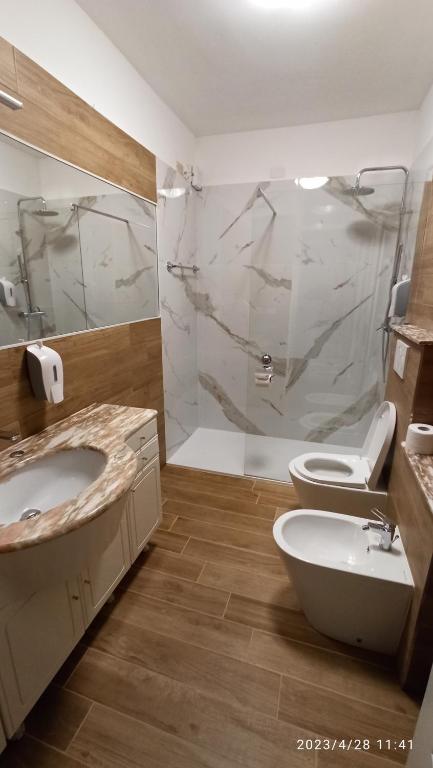 Koupelna v ubytování Appartamento Taverna Gattolini Venzone