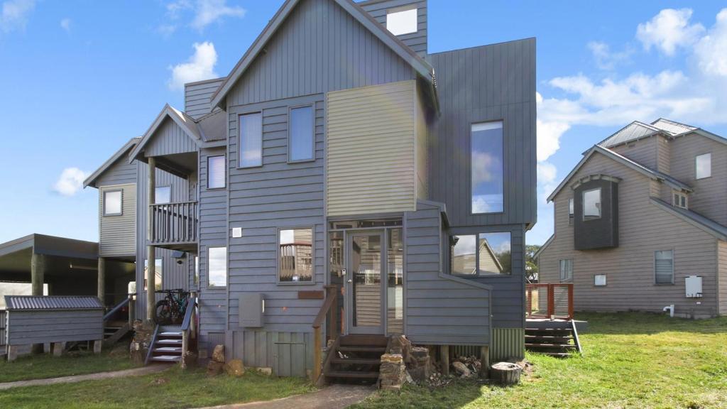 a house is shown with a house at Breck in Dinner Plain