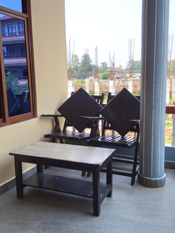 A balcony or terrace at Hotel Mirage Sauraha