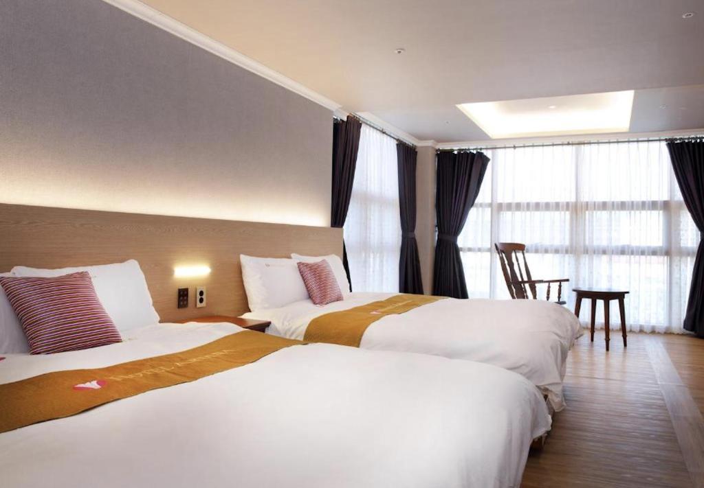 Postel nebo postele na pokoji v ubytování Ariana Hotel