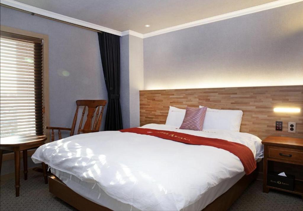 Postel nebo postele na pokoji v ubytování Ariana Hotel