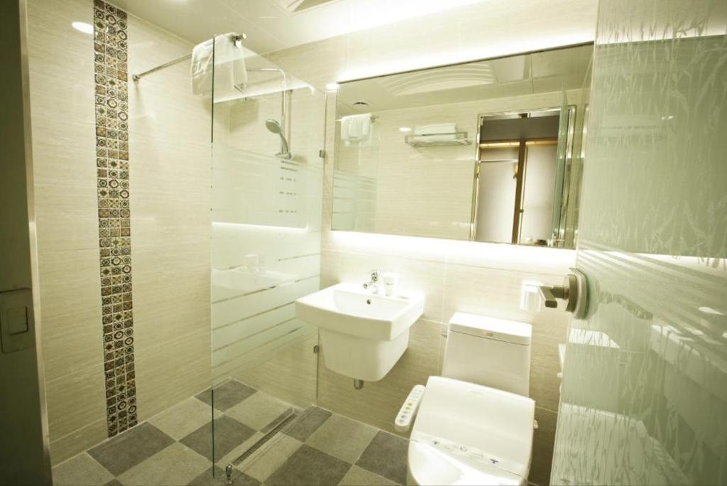 Koupelna v ubytování Ariana Hotel