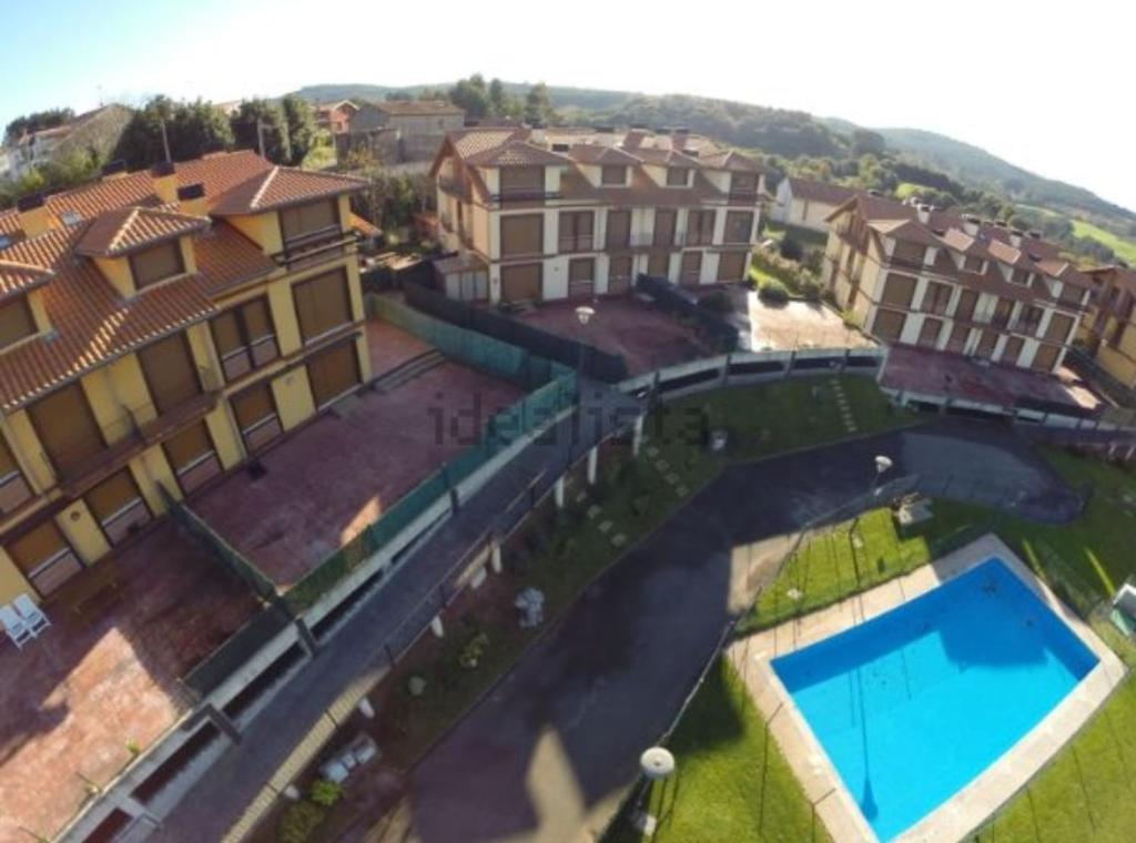 an overhead view of a building with a swimming pool at URIFER in Cóbreces