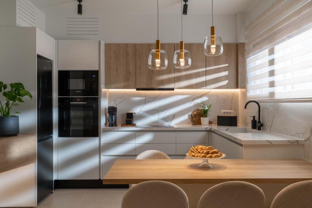 Kuchyň nebo kuchyňský kout v ubytování Mariann Premium Suites