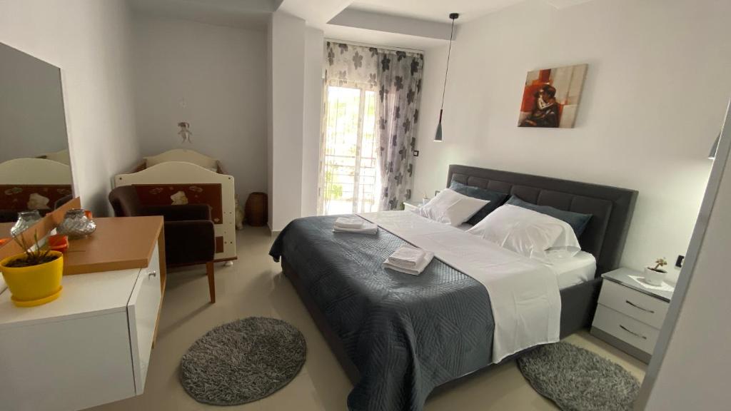 Postel nebo postele na pokoji v ubytování Guest's Apartament