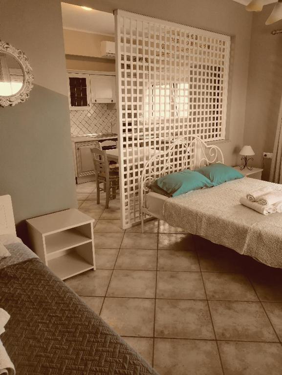 Posteľ alebo postele v izbe v ubytovaní Antoni's Rooms