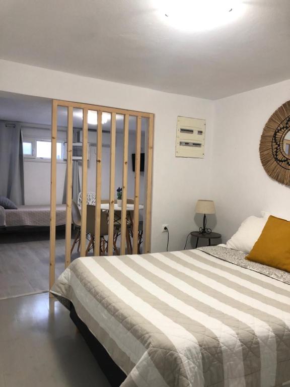 Postel nebo postele na pokoji v ubytování Afrodete Hotel
