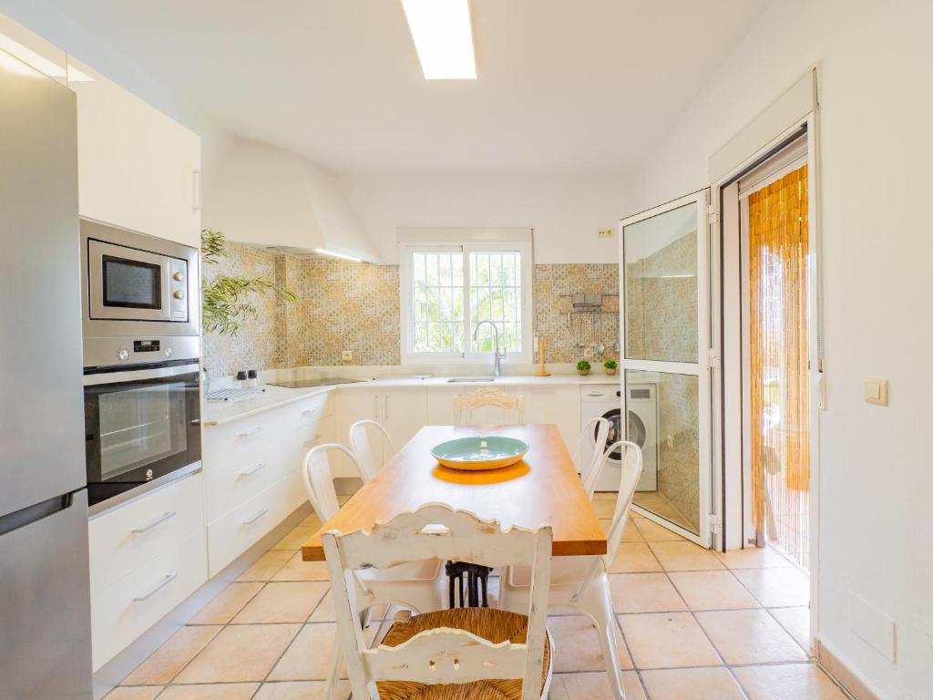 Kuchyň nebo kuchyňský kout v ubytování Cubo's Villa La Quinta