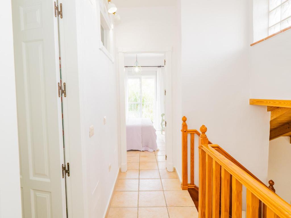 Postel nebo postele na pokoji v ubytování Cubo's Villa La Quinta