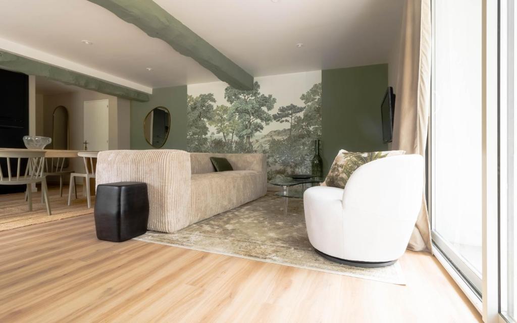 Posedenie v ubytovaní MANOIR DU VAU D ARZ gîtes et chambres d hôtes avec piscine