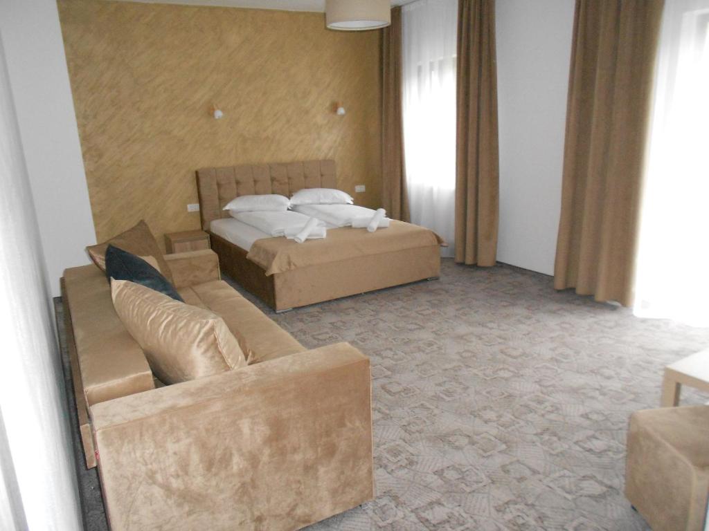 Un pat sau paturi într-o cameră la Andrana