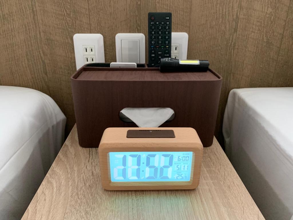 Postel nebo postele na pokoji v ubytování 若 京都河原町ホテル Waka Kyoto Kawaramachi Hotel