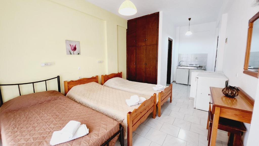 A bed or beds in a room at VILLA ELENA
