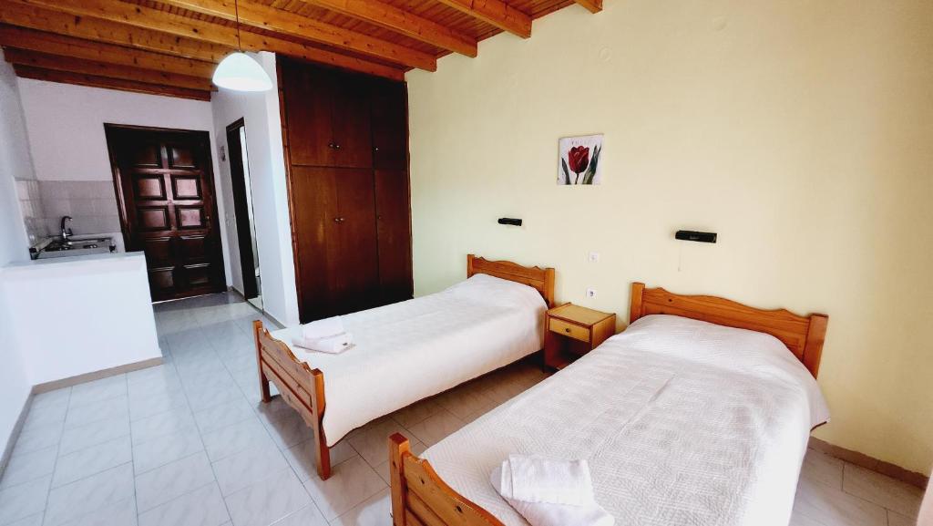 A bed or beds in a room at VILLA ELENA