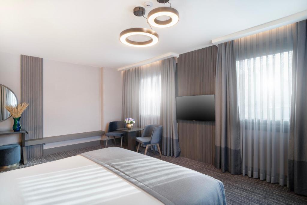 Arts Hotel Taksim客房内的一张或多张床位