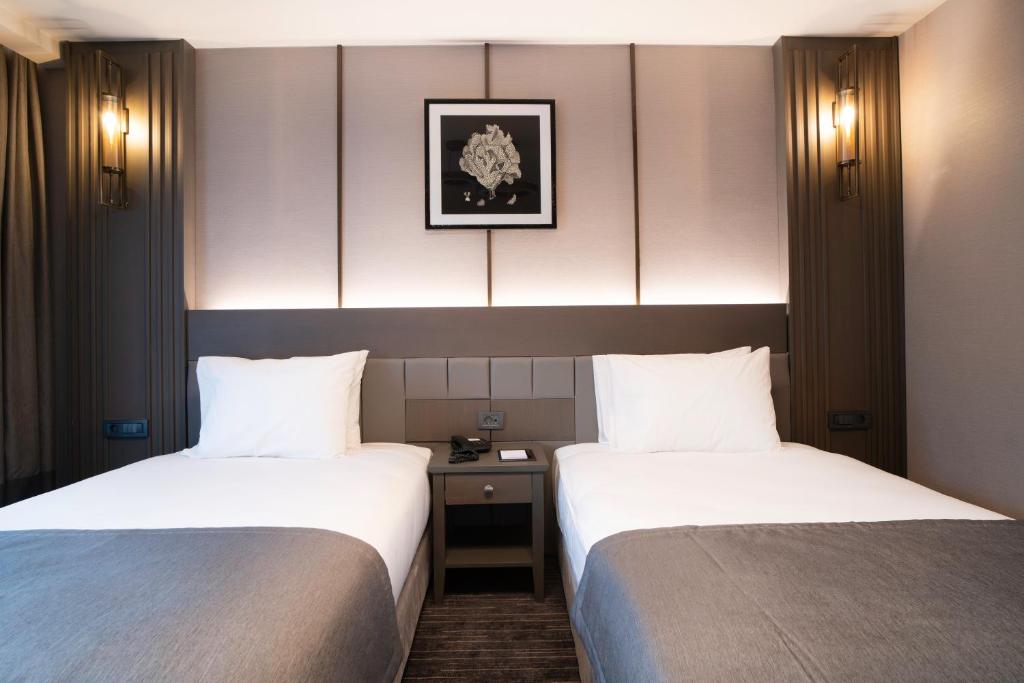 Arts Hotel Taksim客房内的一张或多张床位