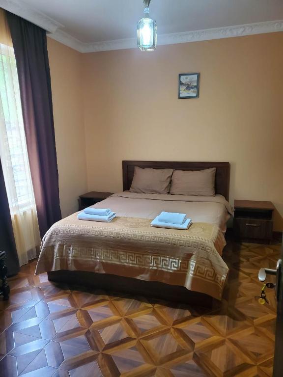 Postel nebo postele na pokoji v ubytování СУХУМИЯ