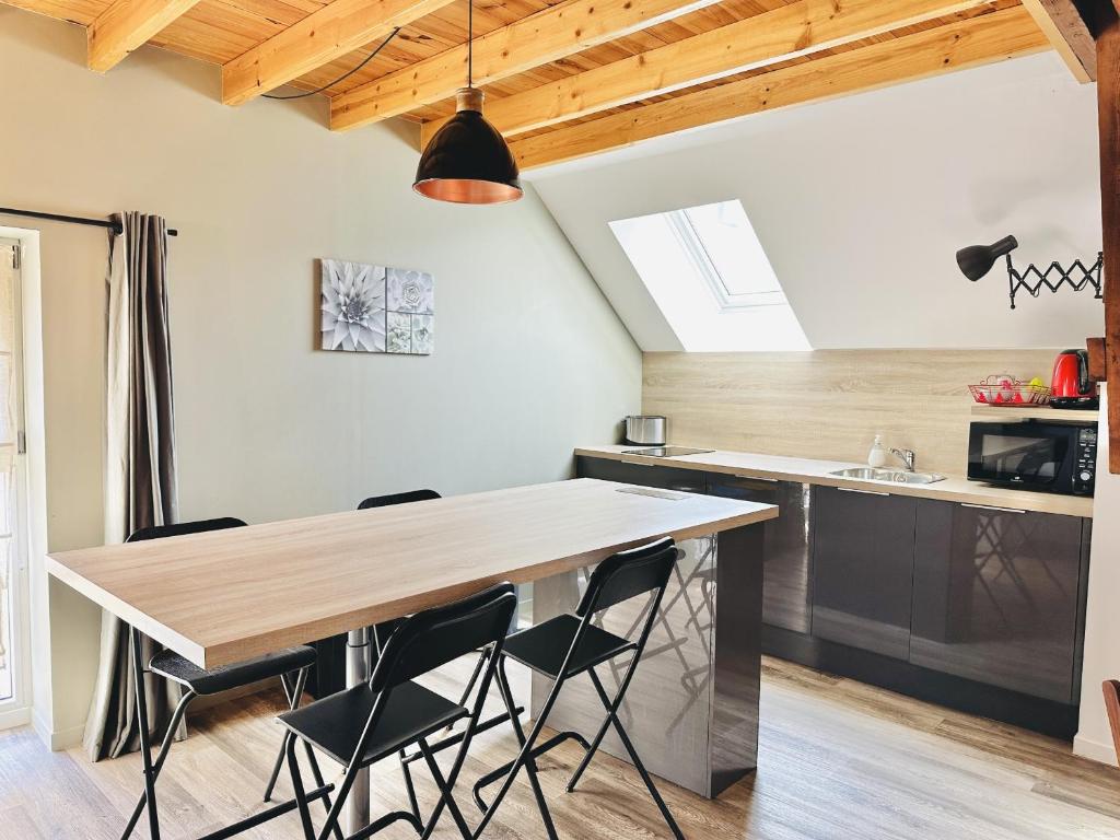 Kuchyňa alebo kuchynka v ubytovaní Le Patio de Loiseau