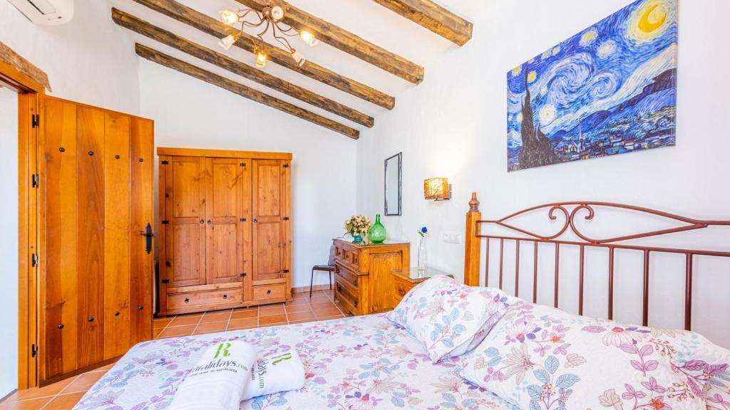 Postel nebo postele na pokoji v ubytování Cortijo Maravilla Frigiliana by Ruralidays