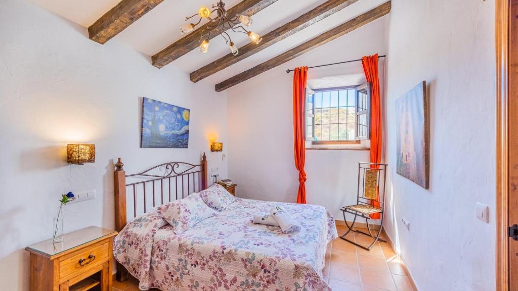 Postel nebo postele na pokoji v ubytování Cortijo Maravilla Frigiliana by Ruralidays