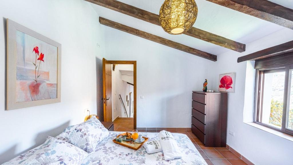 Postel nebo postele na pokoji v ubytování Cortijo Maravilla Frigiliana by Ruralidays